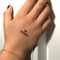 No Excuses bold ink motivational temporary tattoo on back of hand, empowering tattoo by Motivink.