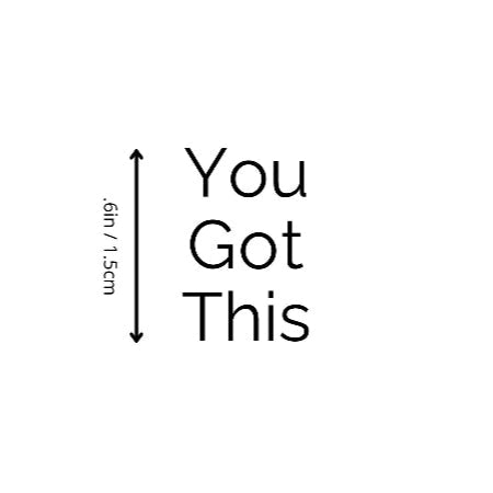 You Got This motivational temporary tattoo by Motivink, minimalist design with size reference 0.6 in / 1.5 cm.
