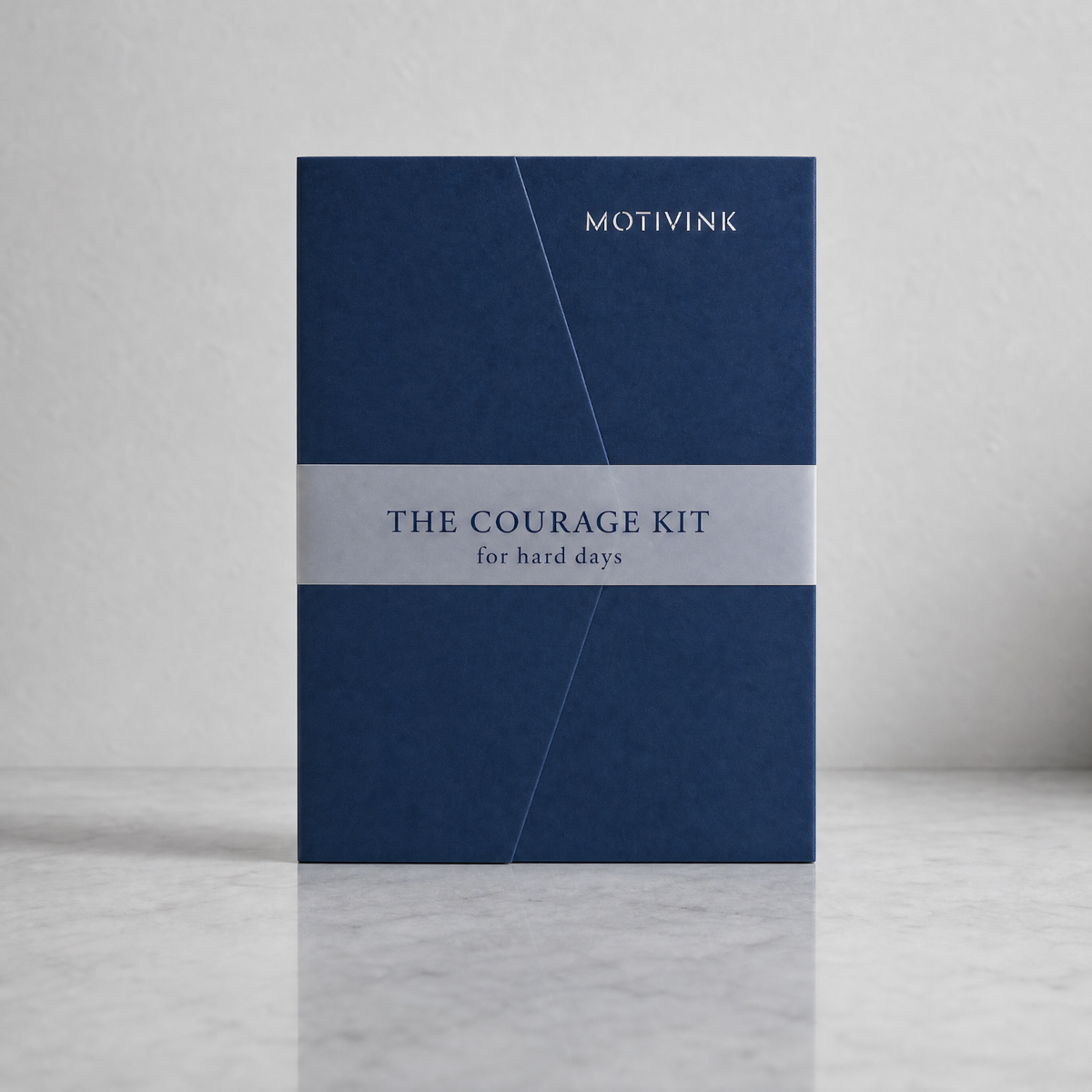 The Courage Kit encouragement gift by MotivInk, navy keepsake folder with 12 motivational temporary tattoos