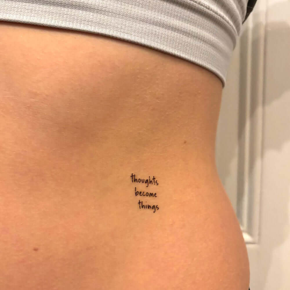 Thoughts become things motivational temporary tattoo on waist, manifestation tattoo by Motivink.
