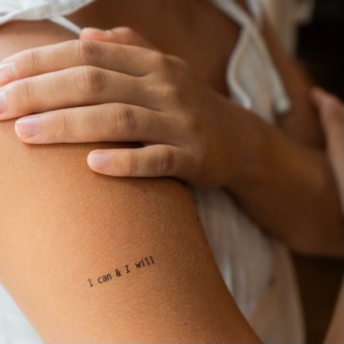 I can & I will motivational temporary tattoo on upper arm, powerful inspirational quote for mindset and action. Design by MotivInk.